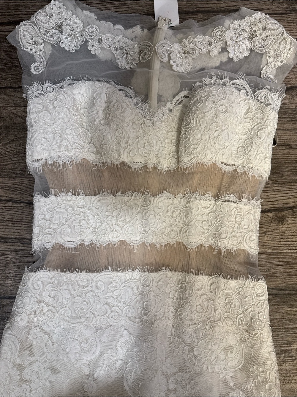 Isabelle Armstrong
Wedding Dress in White - Picture 2 of 10